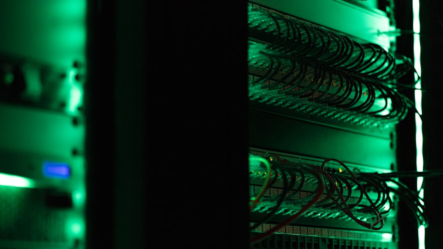 Server racks lit in a dark data centre
